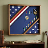 flag display box, wooden flag display case, red white and blue flag box, patriotic flag display case, wood flag box, glass front wooden flag display box, handcrafted patriotic wood flag case, wall mountable flag display box, durable solid wood red white blue flag case, triangular folded flag display box, memorial flag display box patriotic theme, veteran gift red white blue flag case, military retirement flag display box